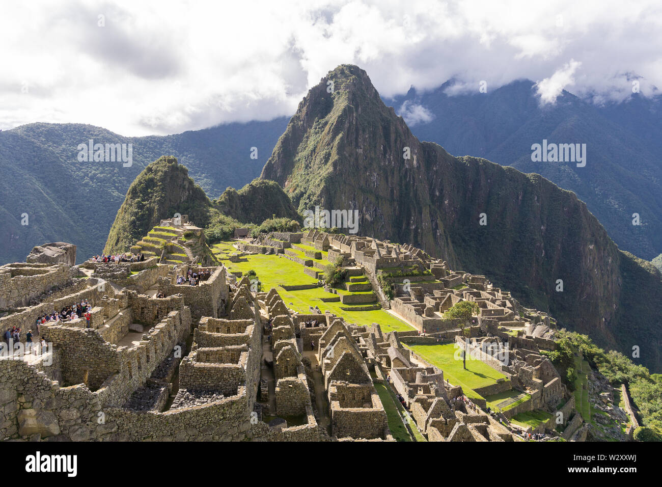 Machu Picchu Unesco geschützten Kulturerbes - Machu Picchu Zitadelle mit dem Huayna Picchu Berg im Hintergrund, Peru, Südamerika. Stockfoto