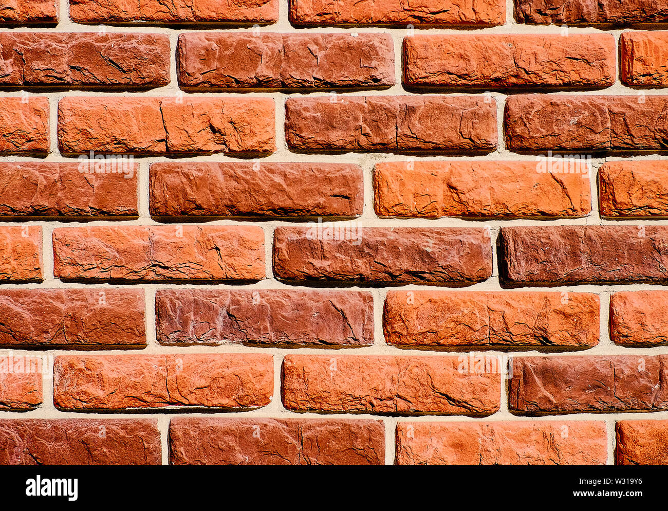 Hintergrund der Wandbeschaffenheit Muster aus rotem Backstein. Ideal für Graffiti Inschriften. Stockfoto