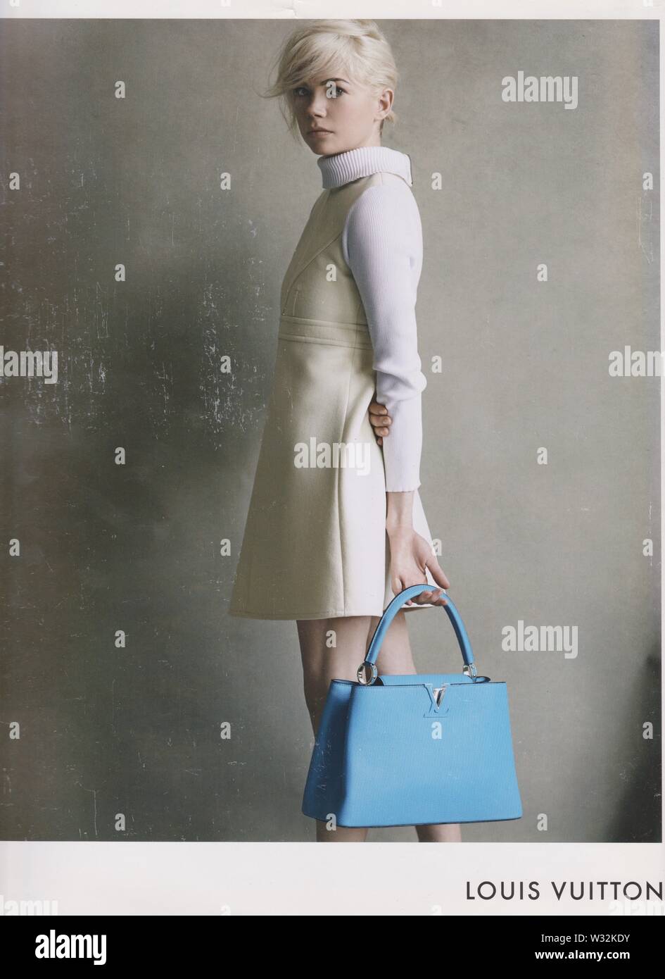 Plakat werbung Louis Vuitton Handtasche mit Michelle Williams Schauspielerin in Papier Magazin aus 2014, Werbung, kreative Werbung von 2010 s Stockfoto