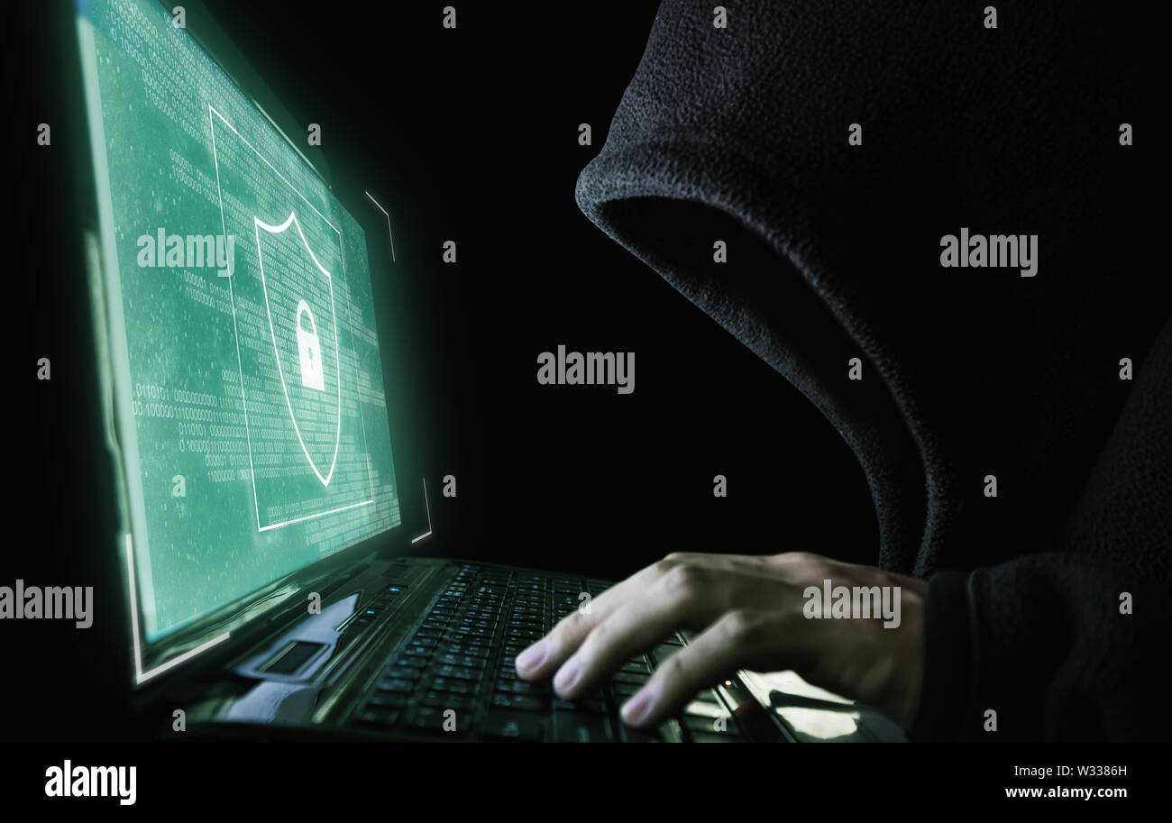 Digitale Daten Sicherheit und Schutz. Anonyme Hacker versuchen, Hacking auf dem Computer Laptop Stockfoto