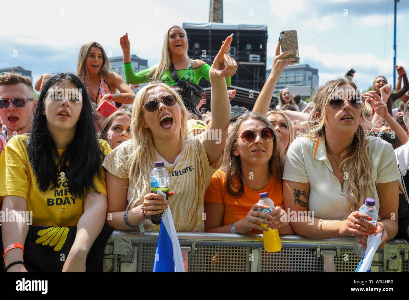 Glasgow, Schottland, Großbritannien. 12. Juli, 2019. Glasgow ist Gastgeber der jährlichen TRNSMT open air Musikfestival in Glasgow Green, mit einem Publikum von Tausenden genießen die Musik an einem sonnigen Sommertag. Credit: Findlay/Alamy leben Nachrichten Stockfoto