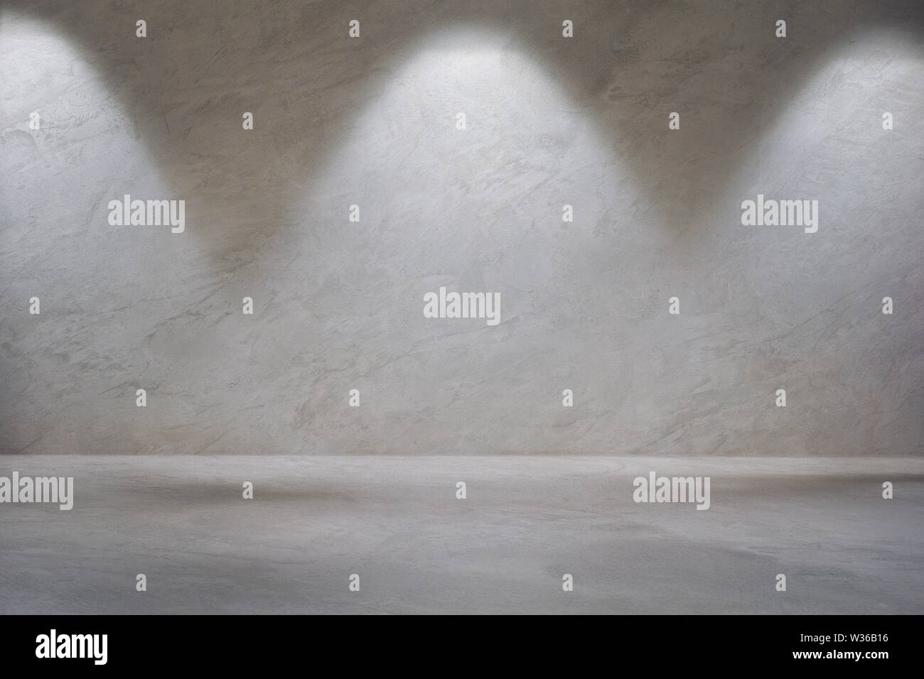 Weiße graue Betonwand mit Wand Licht und leerer Betonboden für Hintergrund design Stockfoto