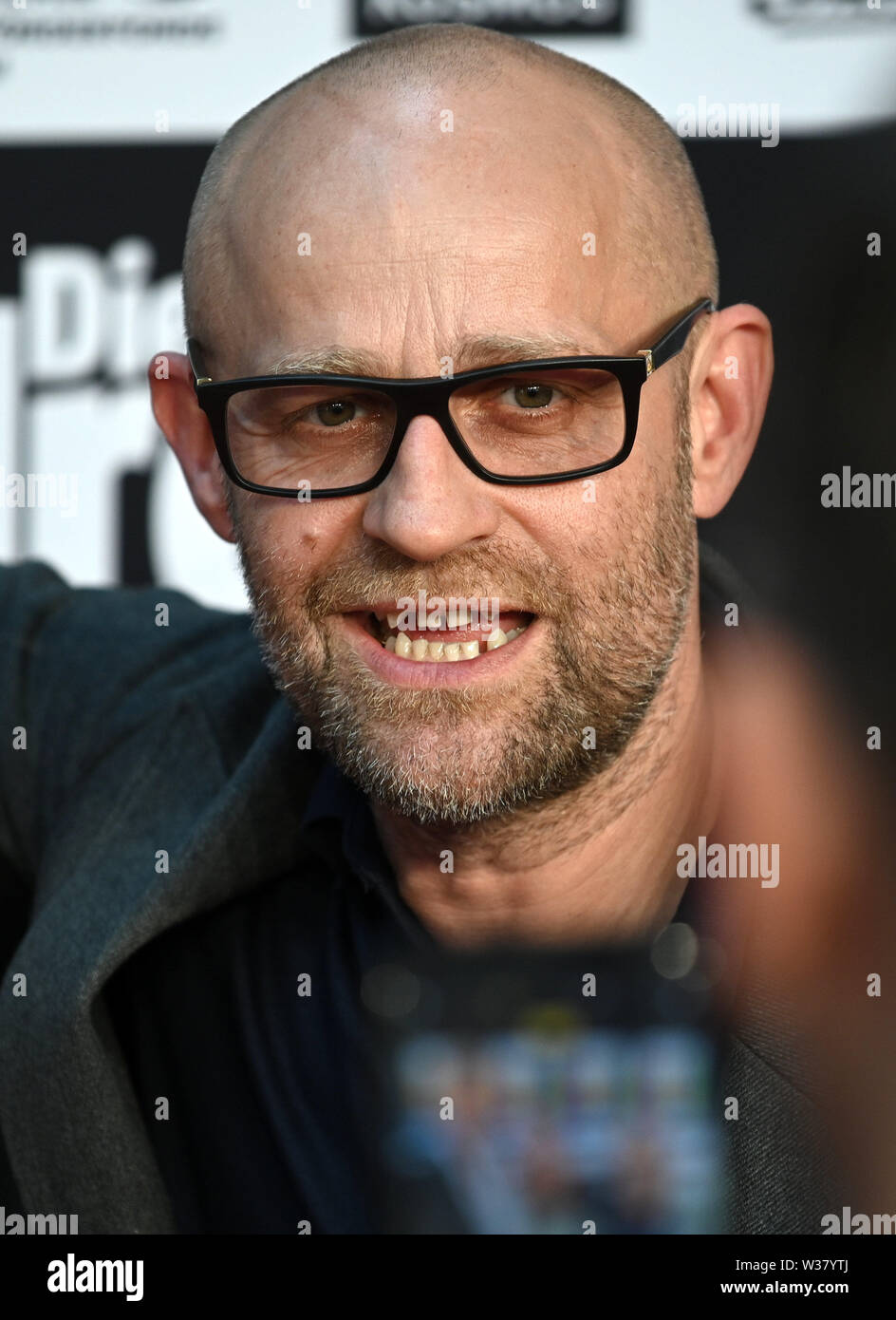 Köln, Deutschland. 13. Juli, 2019. Der Schauspieler Jürgen Vogel kommt zur Premiere der Film 'Die Drei!!!". Quelle: Henning Kaiser/dpa/Alamy leben Nachrichten Stockfoto