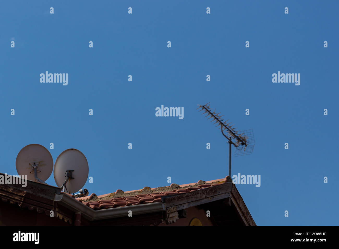 Alte und neue Art fernsehen Antenne Stockfoto