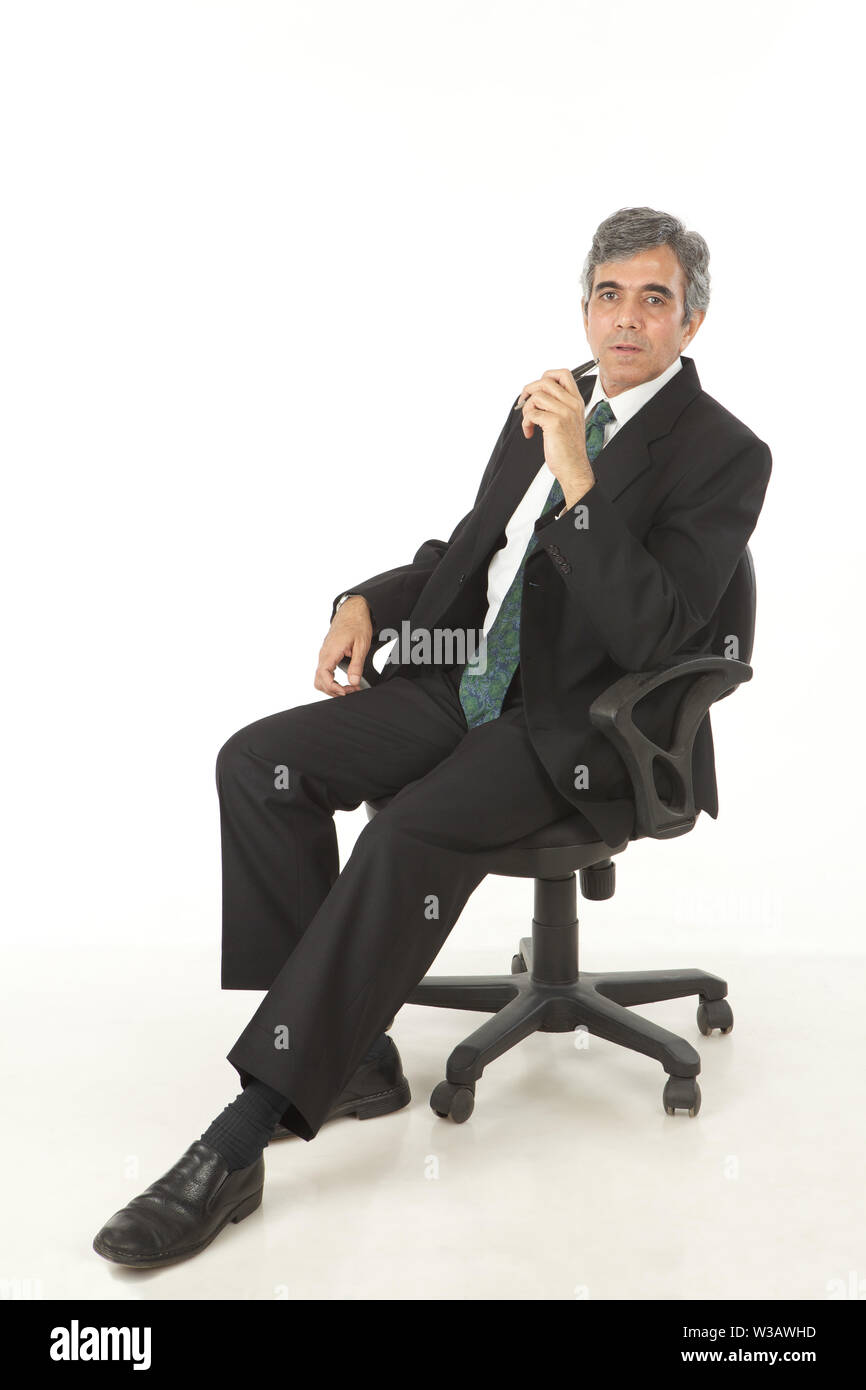 Geschäftsmann, sitzen in einem Bürostuhl Stockfoto
