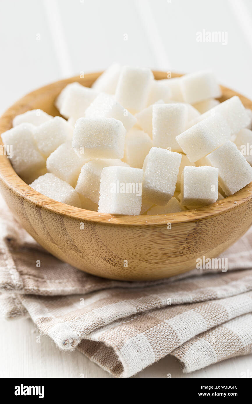 Sweet Sugar Cubes in Houten. Stockfoto
