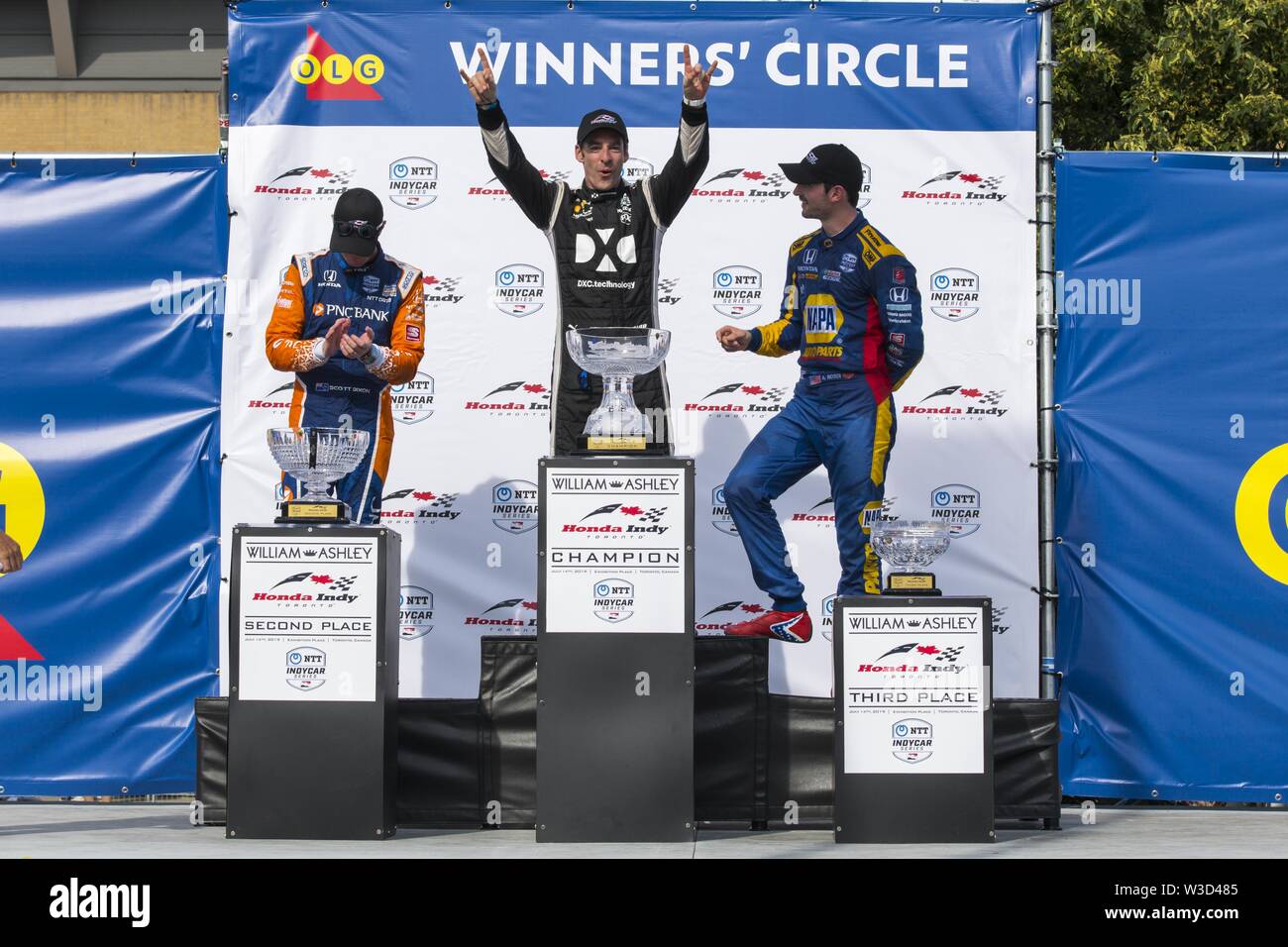 Toronto, Ontario, Kanada. 14. Juli, 2019. SIMON PAGENAUD (22), Scott Dixon (9) und ALEXANDER ROSSI (27) feiern gewinnen in der Verizon Indycar Series Honda Indy Toronto Rennen in Toronto, Kanada Kredit statt: Engel Marchini/ZUMA Draht/Alamy leben Nachrichten Stockfoto