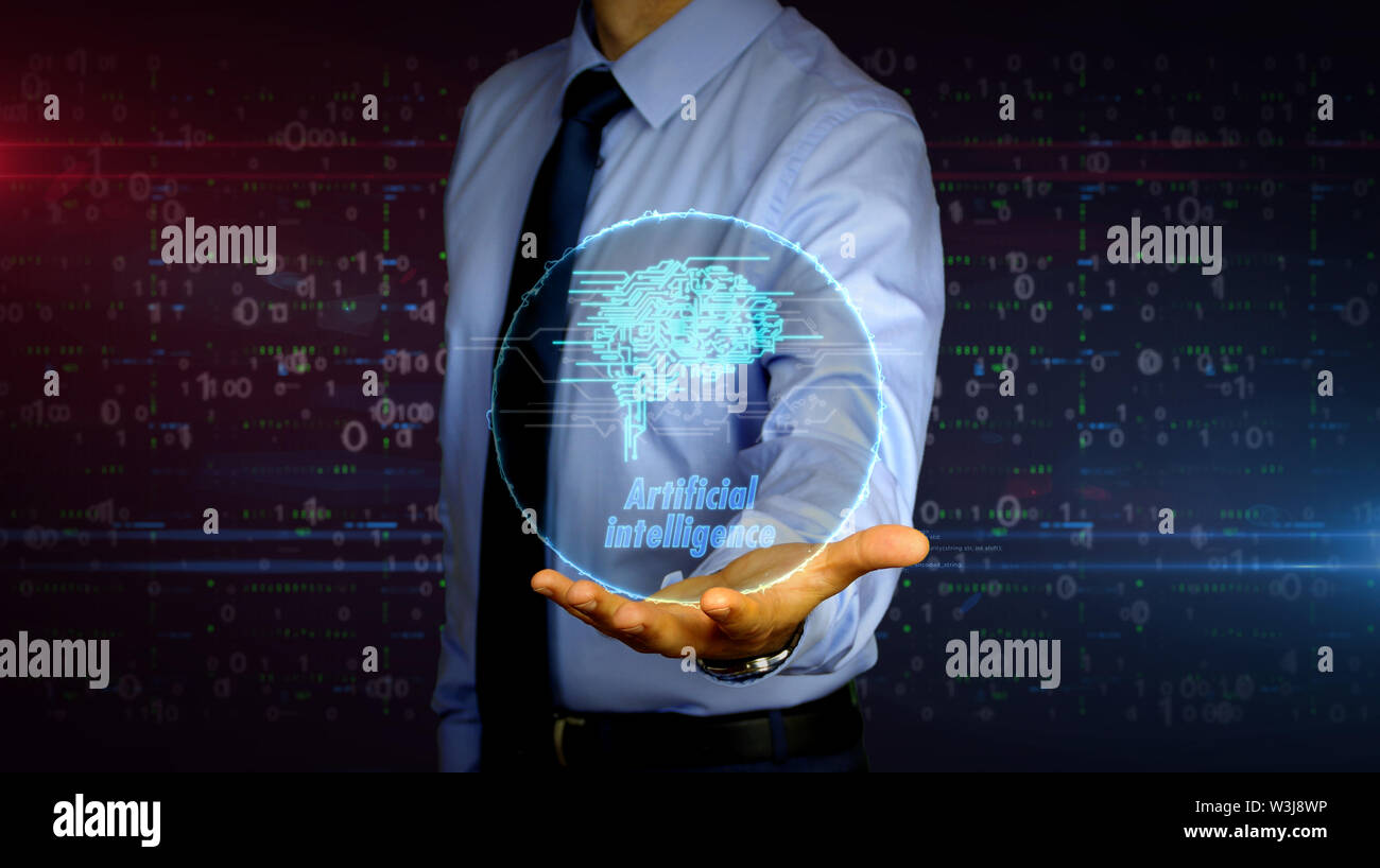 Mann mit dynamischen kybernetische Gehirn symbol Hologramm auf der Hand. Geschäftsmann und futuristisches Konzept der künstlichen Intelligenz, Lernen und cyber mind Stockfoto