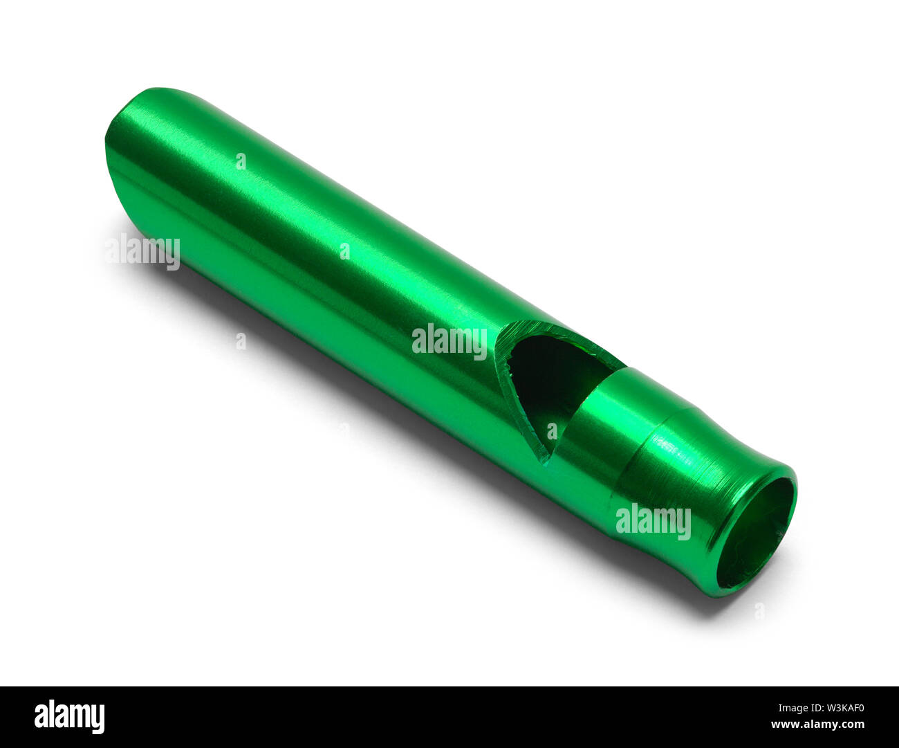 Kleine grüne Hund Pfeife isoliert auf weißem Hintergrund. Stockfoto