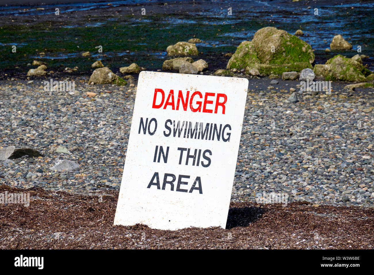 Gefahr kein Schwimmen in diesem Bereich am Strand von Crescent Beach, B.C., Kanada Stockfoto