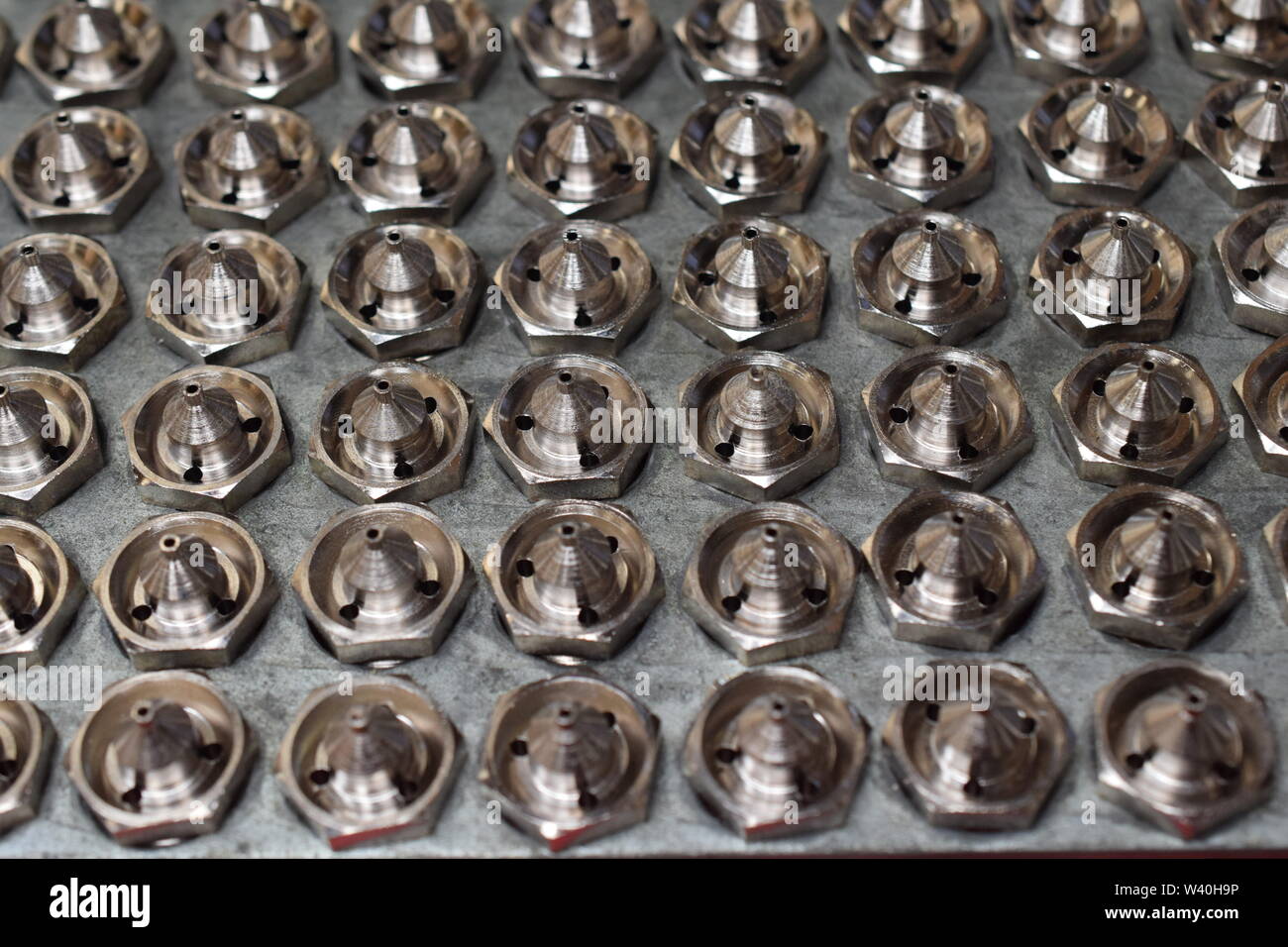 Tipp für Farbspritzpistole Herstellung für CNC-Maschine. Detail der Spritzpistole Teile. Stockfoto