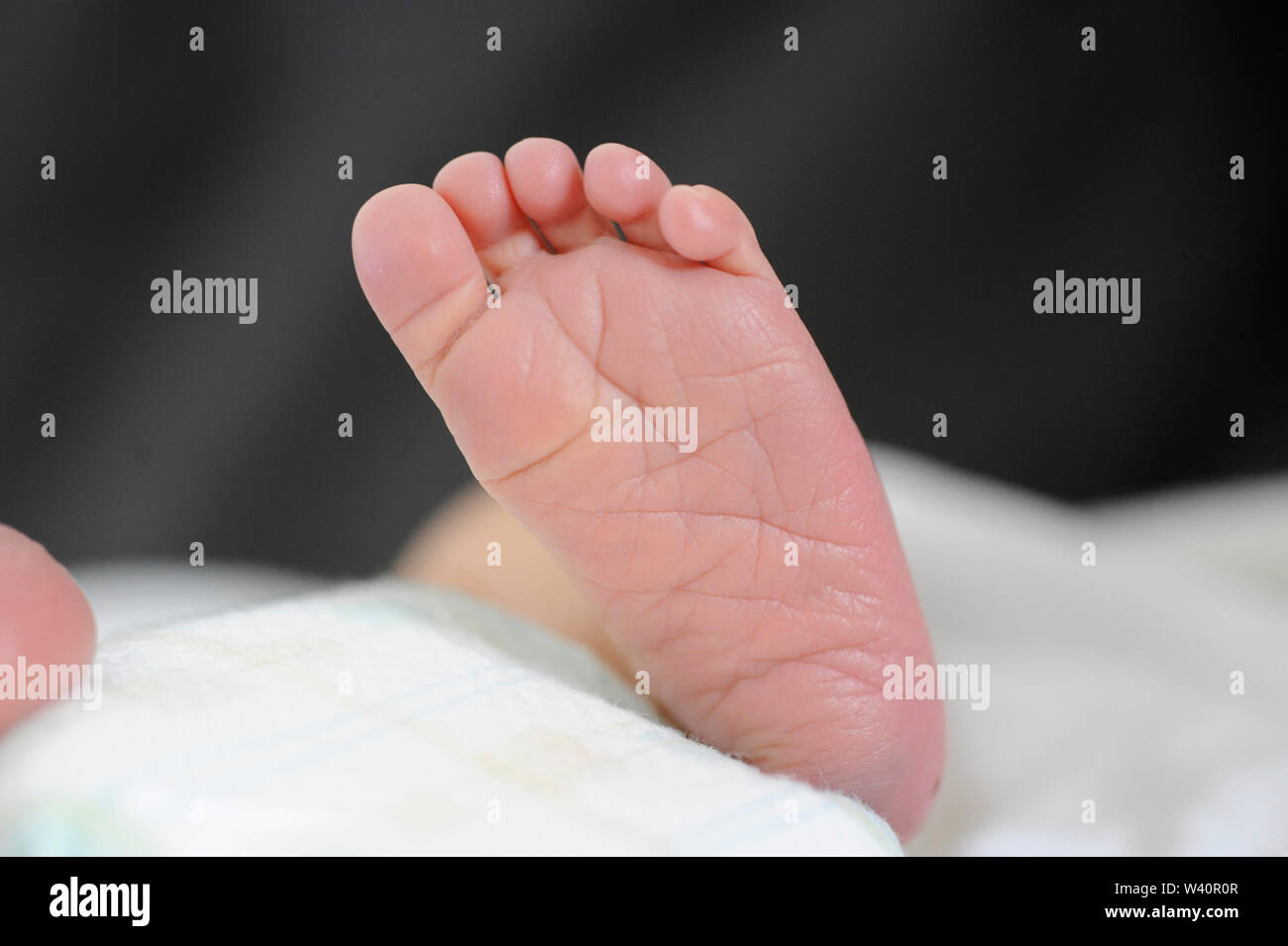 Nahaufnahme eines Babys Füße Stockfoto