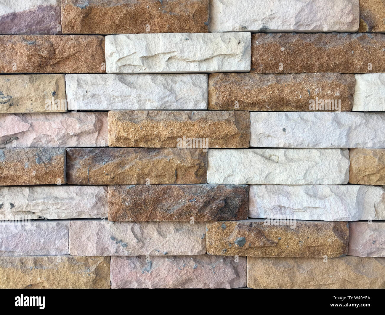 Brick Wall von orange Farbe Textur. Alte Vintage schmutzige Backsteinmauer Textur Hintergrund Bild. Grunge Weiße und Braune Steinmauern Hintergrund. Bric-wallpap Stockfoto