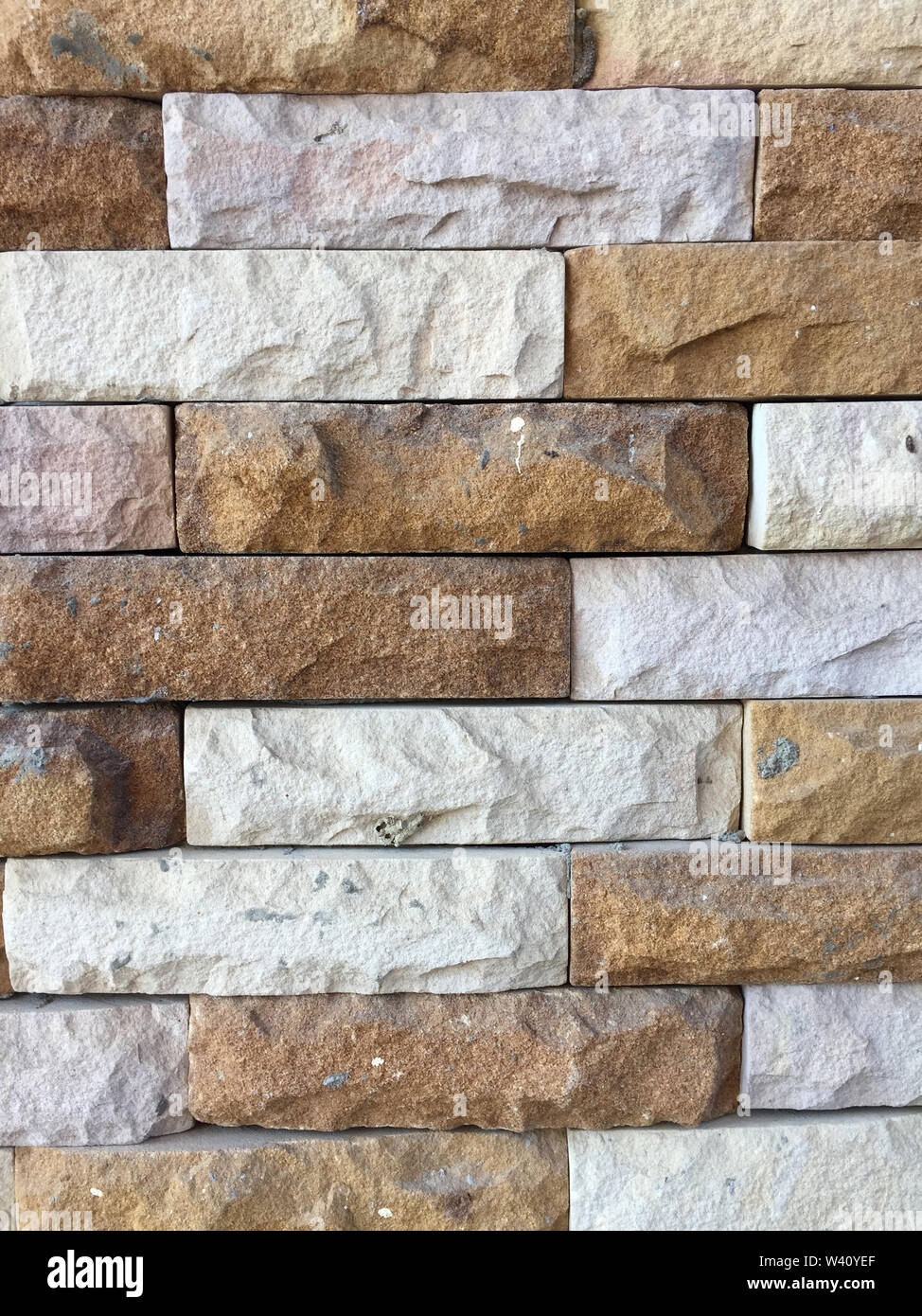 Brick Wall von orange Farbe Textur. Alte Vintage schmutzige Backsteinmauer Textur Hintergrund Bild. Grunge Weiße und Braune Steinmauern Hintergrund. Bric-wallpap Stockfoto