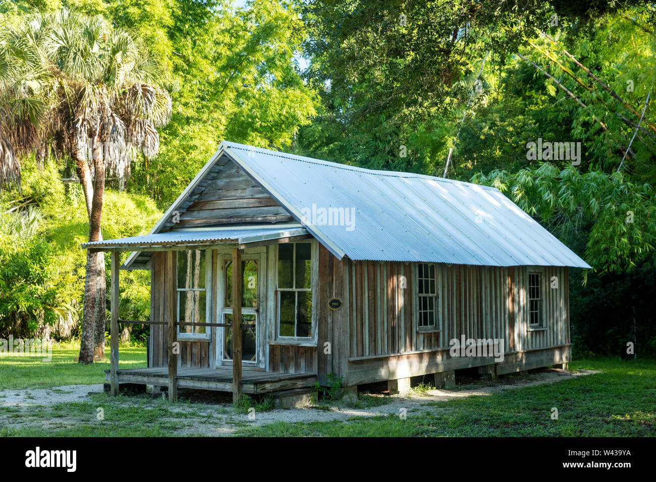 Schlender Cottage auf dem Gelände der Koreshan historische Regelung - eine aus dem 19. Jahrhundert utopischen Kommune, Estero, Florida, USA Stockfoto