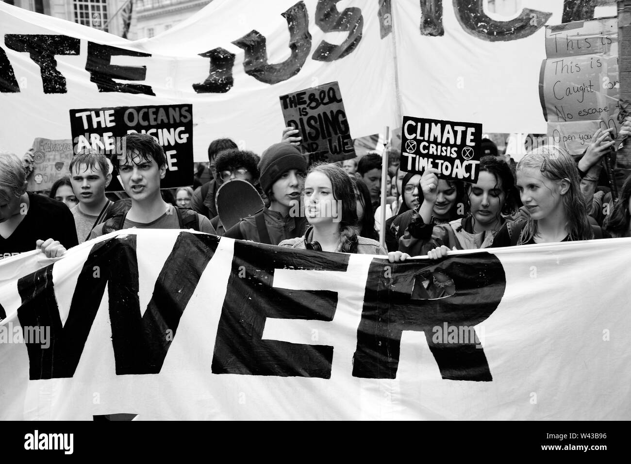 Studenten auf die Straße, um gegen den Klimawandel in London am Freitag, den 19. Juli zu demonstrieren. Stockfoto