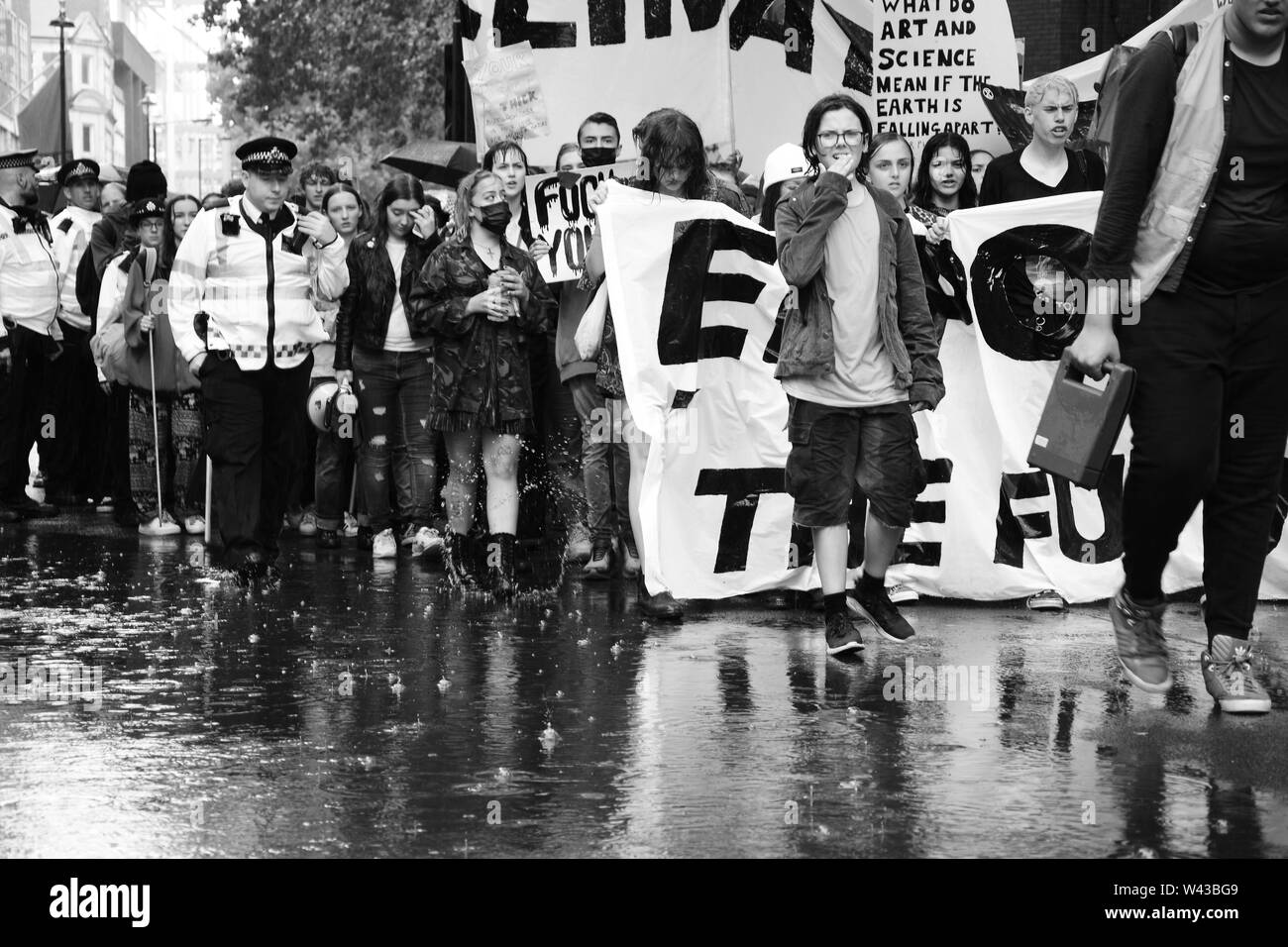 Studenten auf die Straße, um gegen den Klimawandel in London am Freitag, den 19. Juli zu demonstrieren. Stockfoto