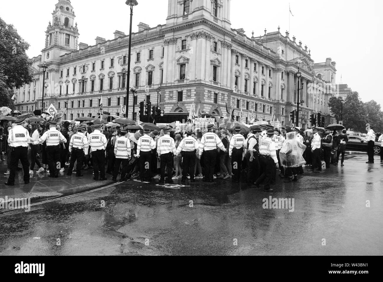 Studenten auf die Straße, um gegen den Klimawandel in London am Freitag, den 19. Juli zu demonstrieren. Stockfoto