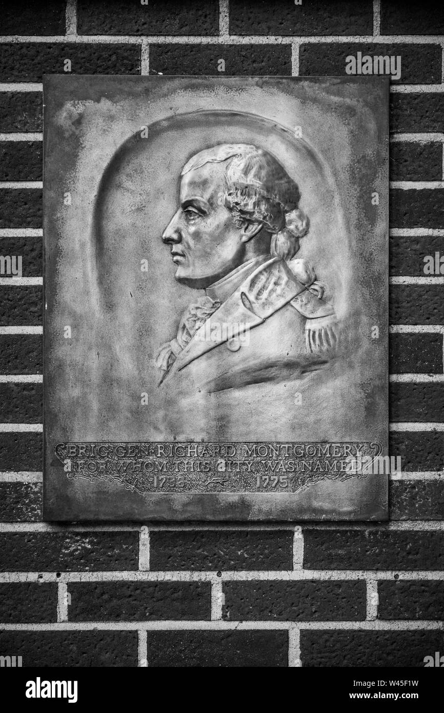 Ein Flachrelief portrait in Metall als Plakette auf ein Red brick wall memorializing ist Brigadegeneral Richard Montomery, für die die Stadt Montgomery, AL Stockfoto