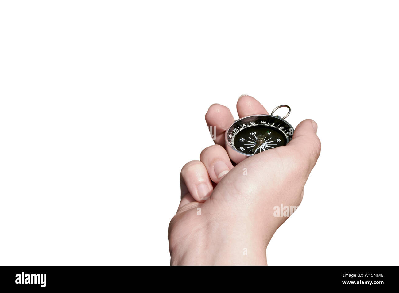 Weibliche Hand Finger Kompass nach Norden. Auf weissem Hintergrund Stockfoto