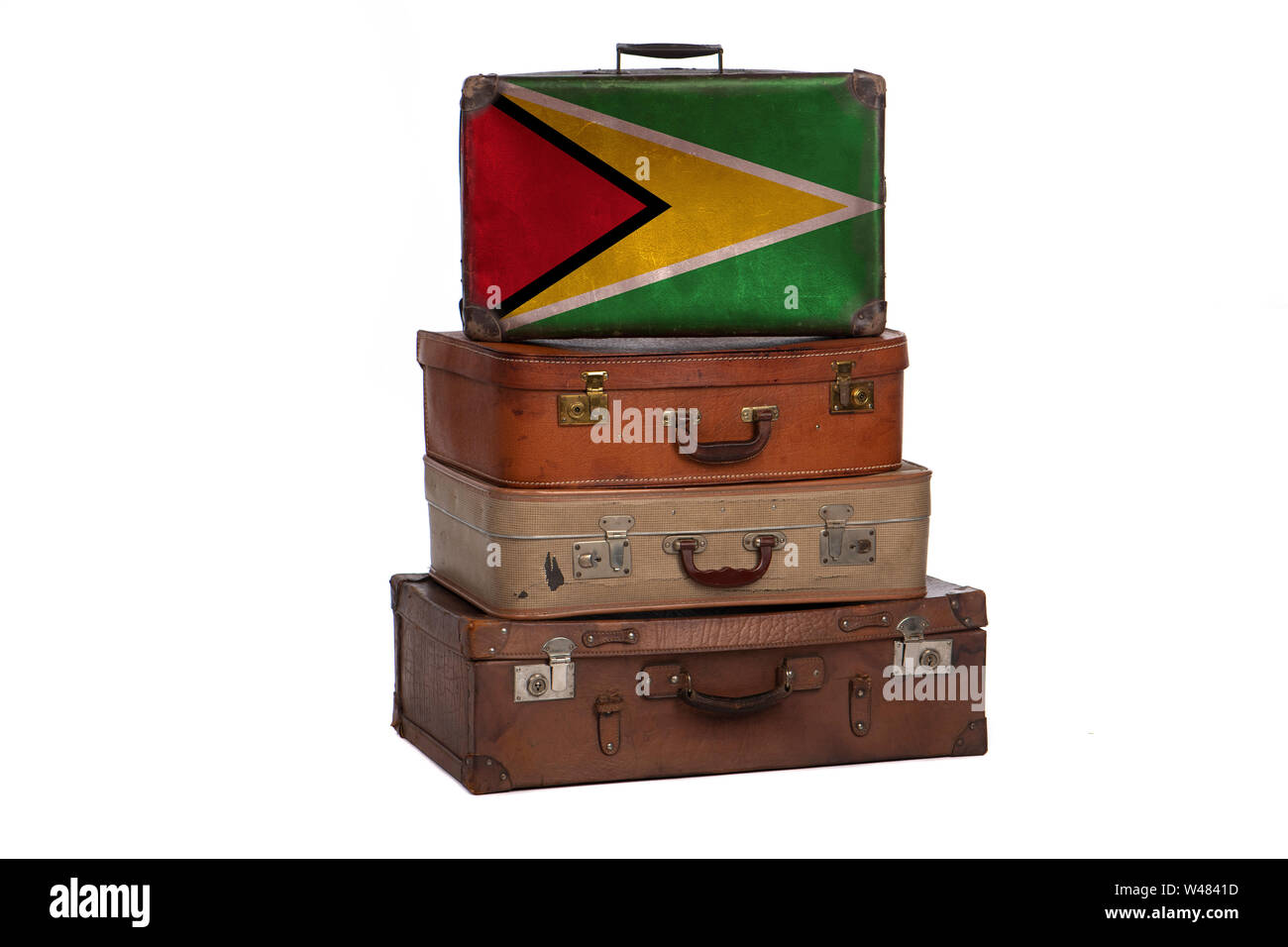 Guyana, Guyanese Travel Concept. Gruppe von Vintage Koffer auf weißem Hintergrund Stockfoto