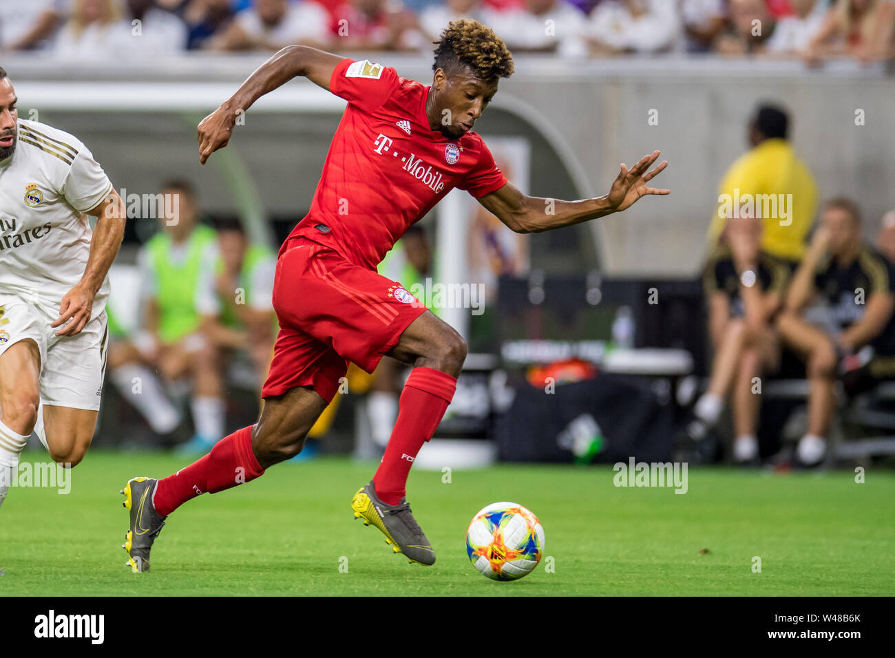 Houston, TX, USA. 20. Juli 2019. Bayern München Mittelfeldspieler Kingsley Coman (29) steuert die Kugel während der ersten Hälfte eines Internationalen Champions Cup Fußball-Match zwischen dem FC Bayern München und Real Madrid an NRG Stadion in Houston, TX. FC Bayern gewann das Spiel 3 zu 1. Trask Smith/CSM/Alamy leben Nachrichten Stockfoto