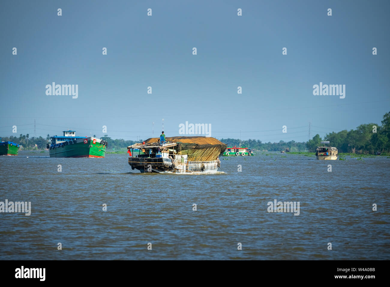 Yacht Transport landwirtschaftliche Produkt auf dem Mekong Fluss. Tien Giang, Vietnam, Mekong Delta. Stockfoto