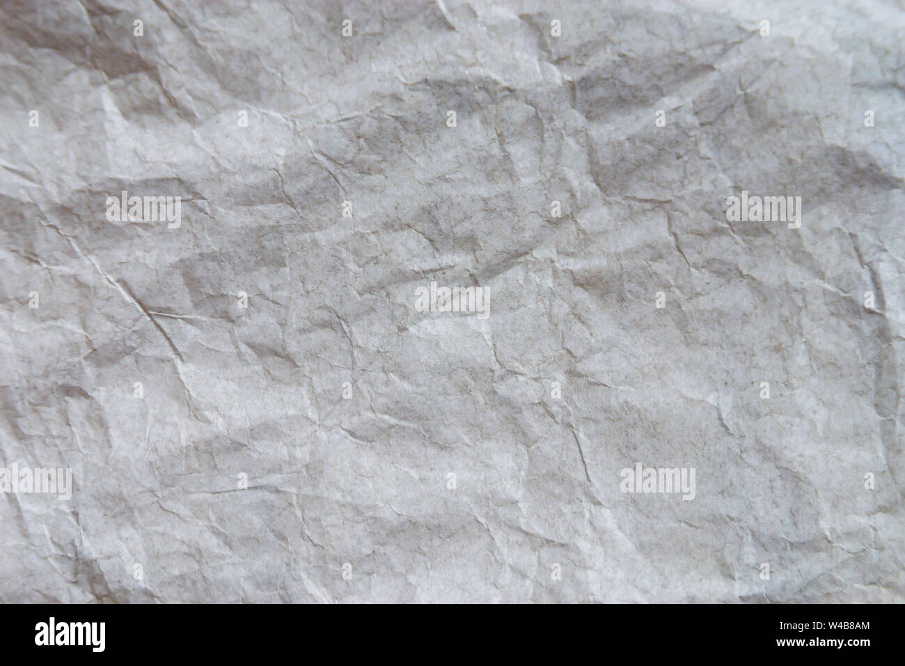 Weiß zerknittertes Papier Textur Hintergrund Stockfoto