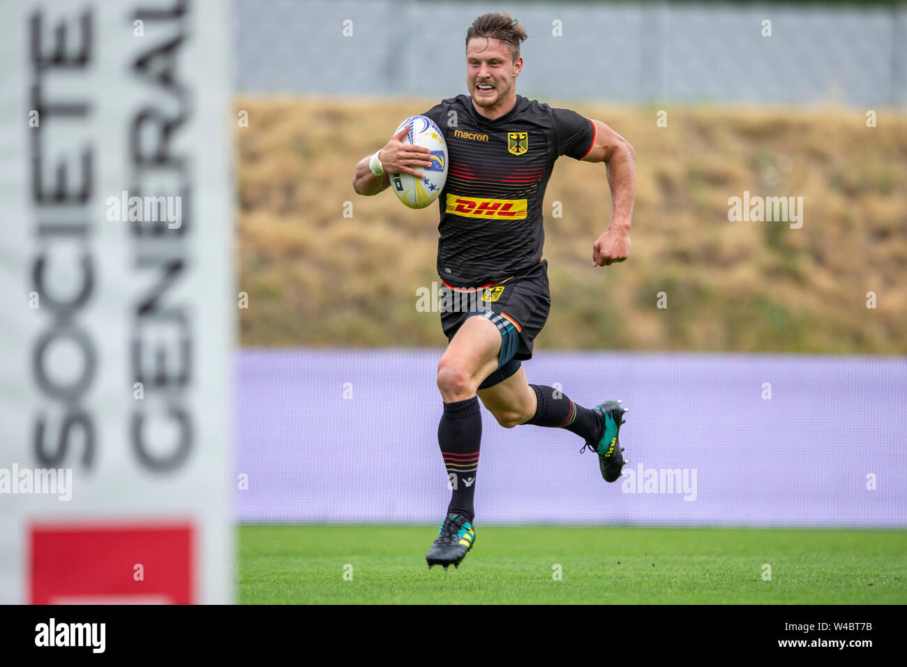 Lodz, Polen. 21. Juli, 2019. Zweites Turnier der Grand Prix Serie im Olympischen Sevener Rugby am 21. Juli 2019 in Lodz. Phil Szczesny (Deutschland) Auf dem Weg in das Halbfinale gegen Irland. Credit: Jürgen Kessler/Kessler-Sportfotografie/dpa/Alamy leben Nachrichten Stockfoto