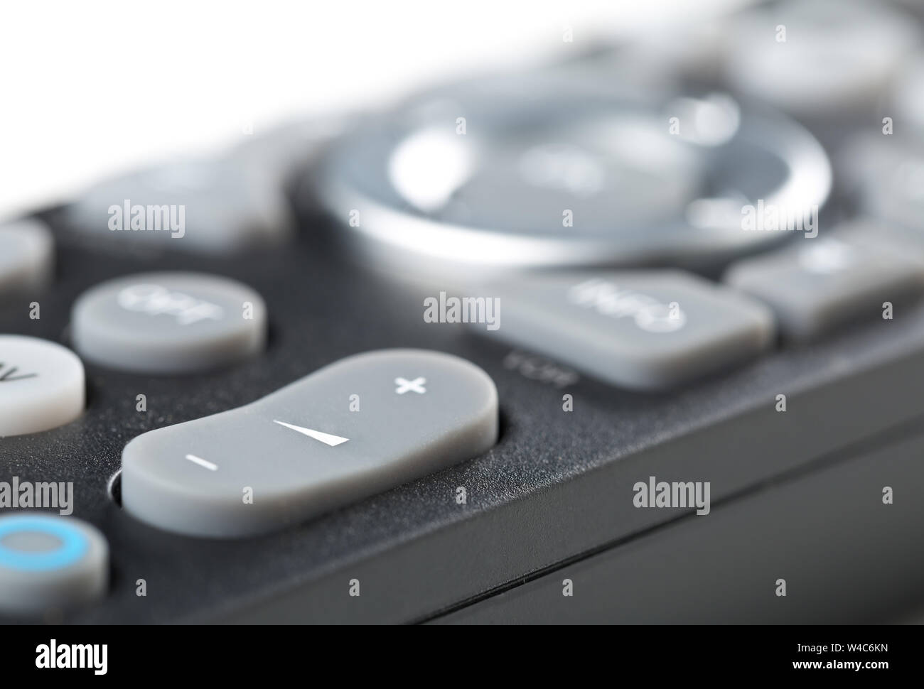 TV-Fernbedienung Makro Nahaufnahme der Schaltfläche Lautstärke mit selektiven Fokus Stockfoto