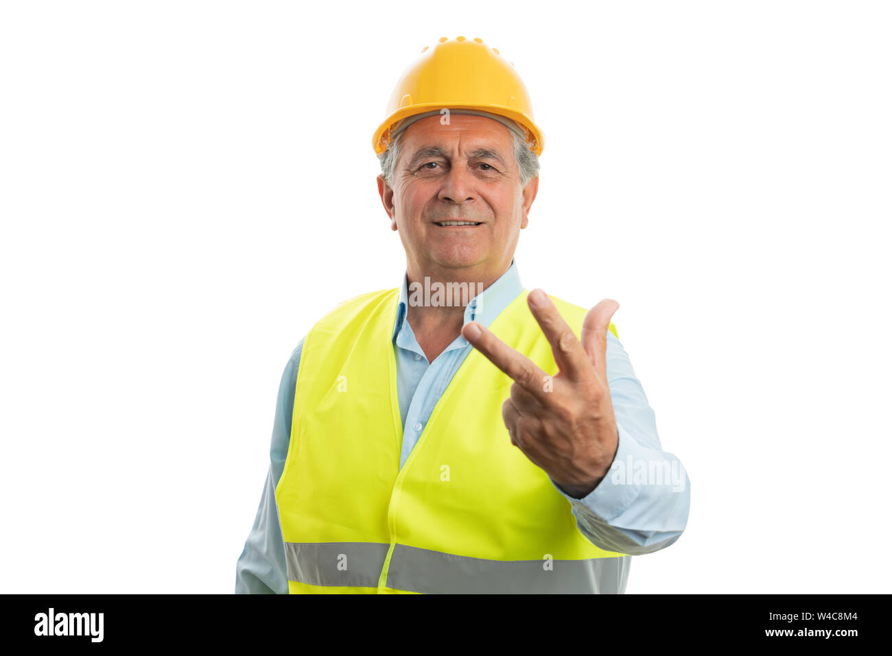 Freundliche männliche alte Builder angezeigt Nummer zwei mit Finger zum Zählen Konzept auf weißem Hintergrund Stockfoto