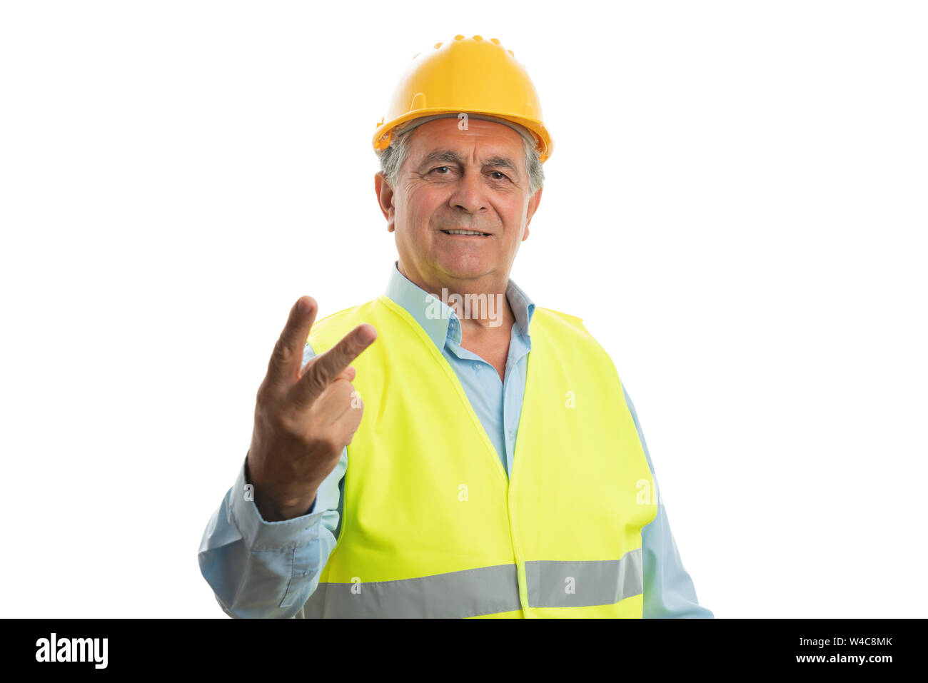 Ernsthafte builder Mann, stop Geste mit Palm und verärgerten Ausdruck auf weißem studio Hintergrund isoliert Stockfoto
