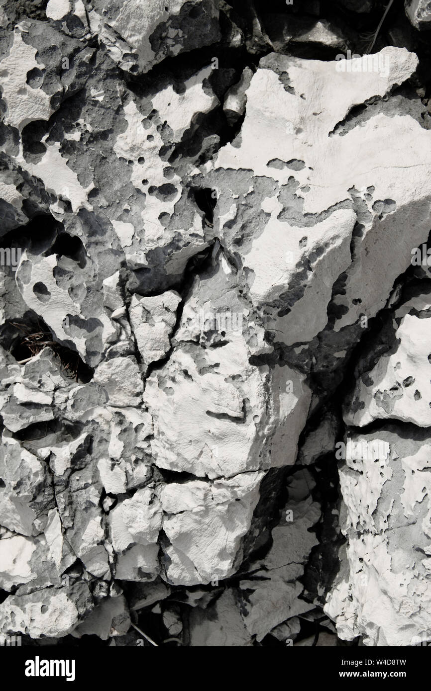 Groben weißen und grauen Stein oder Felsen mit vielen Details gut für Hintergrund Stockfoto