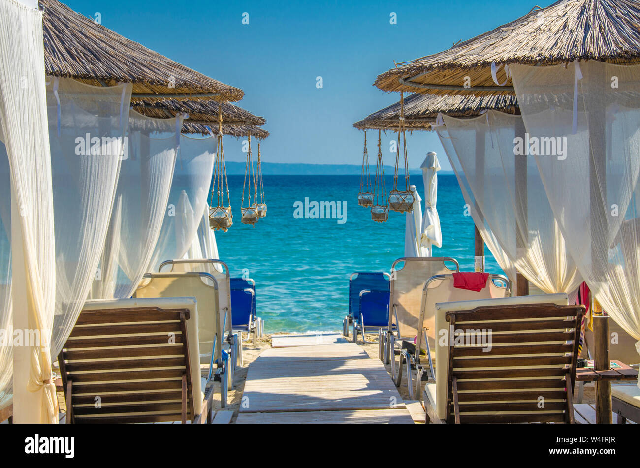 Sommer Szene - Schatten, Sonne tanken und Entspannung - Küste der Ägäis - Griechenland - Denpasar Stockfoto