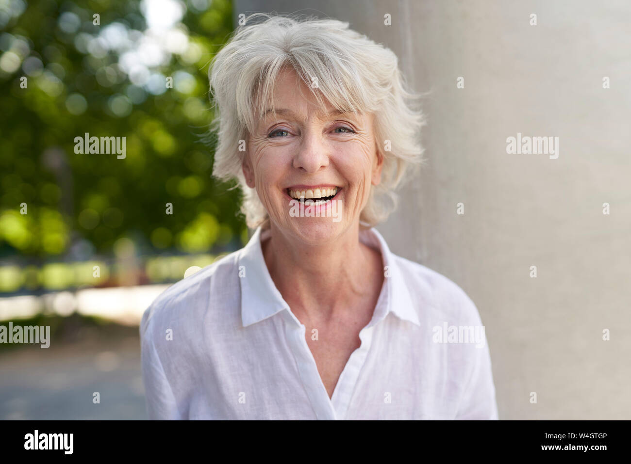 Porträt von glücklich Reife Frau Stockfoto