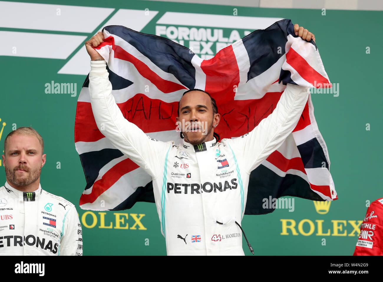 Mercedes' Lewis Hamilton feiert den Sieg des britischen Grand Prix in Silverstone, Towcester. DRÜCKEN SIE VERBANDSFOTO. Bilddatum: Sonntag, 14. Juli 2019. Siehe PA Story AUTO British. Bildnachweis sollte lauten: David Davies/PA Wire. Stockfoto