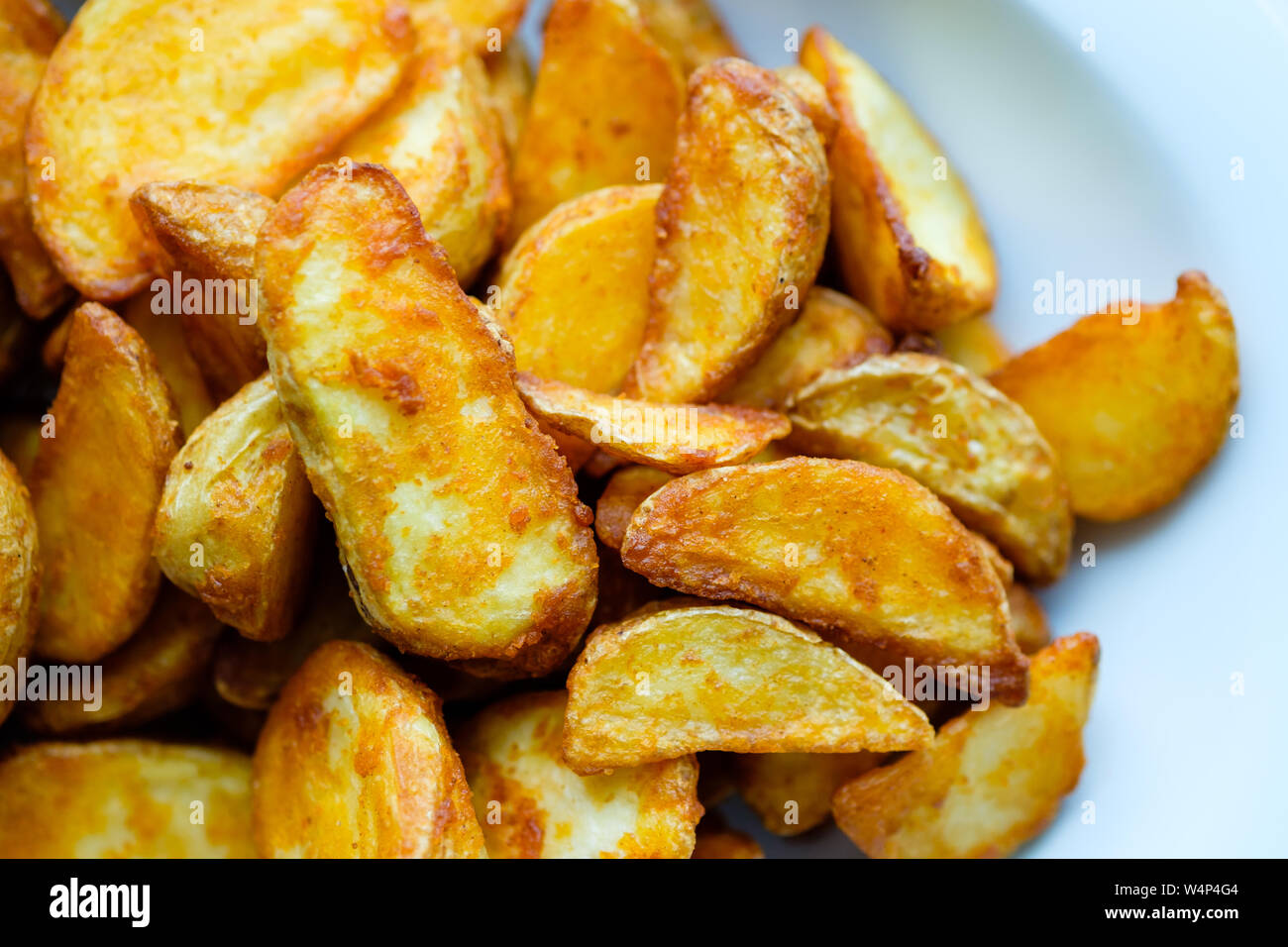 Potato Wedges auf weiße Platte Stockfoto