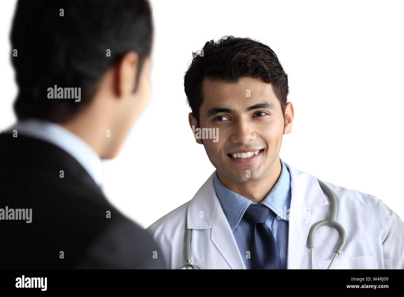 Männlichen Arzt Rücksprache mit patient Stockfoto