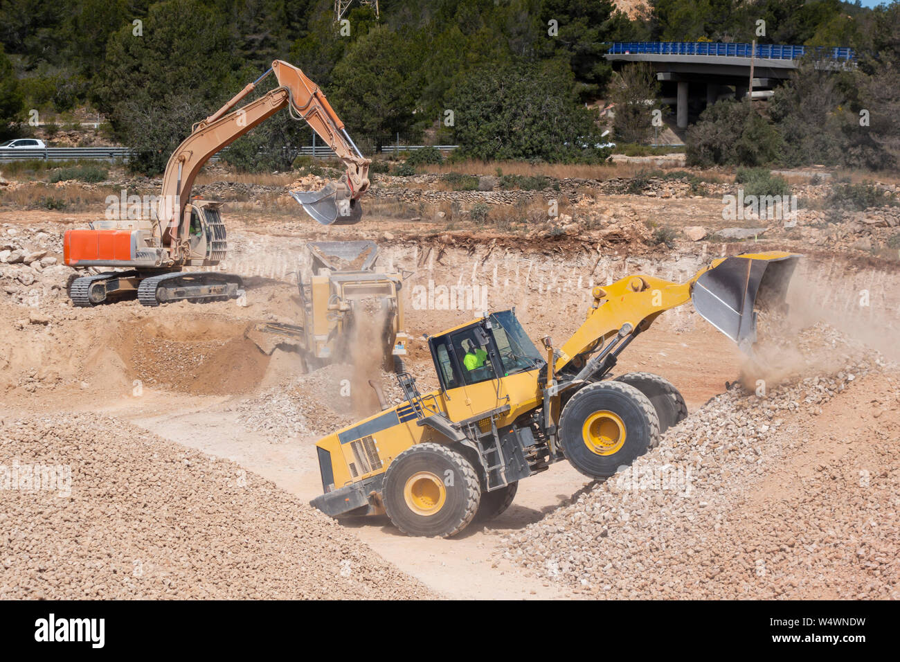 Gebrauchte Maschinen arbeiten in der Baustelle Stockfoto