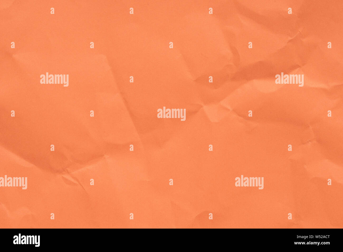 Farbe orange gefaltetes Papier Textur Hintergrund Stockfoto
