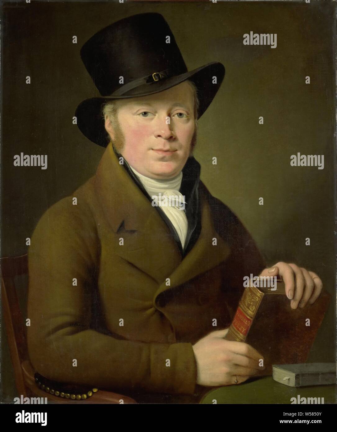 Barend Klijn Barendsz (1774-1829), Dichter, Porträt des Dichters Barend Klijn Barendsz. Bustem, sitzen hinter einem Tisch mit seinem Hut auf und das Buch mit dem Titel 'Vondel Poezy" in seinen Händen., Adriaan de Lelie, 1813, Leinwand, Ölfarbe (Lack), h 74,5 cm x W 62 cm Stockfoto