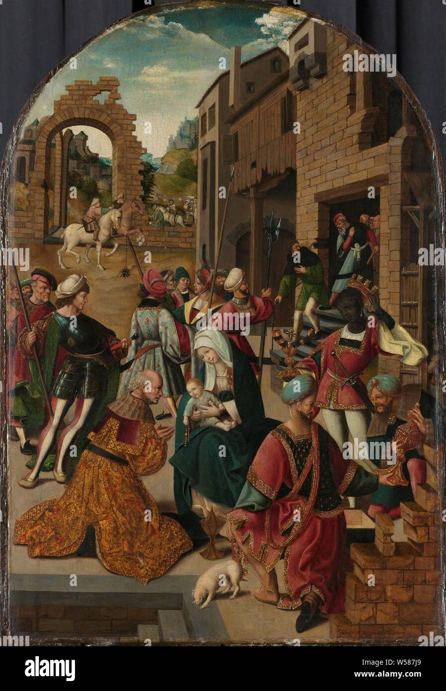 Die Anbetung der Könige, die Anbetung der Heiligen Drei Könige. Maria sitzt vor dem Stall mit dem Kind auf dem Schoß, während ein König in der Anbetung niederkniet. Auf der rechten Seite die beiden anderen Könige, im Hintergrund Soldaten, einige Reiter und andere Figuren, die Anbetung der Könige: die Weisen ihre Geschenke zu Christus - Kind (Gold, Weihrauch und Myrrhe), Jacob CORNELISZ VAN OOSTSANEN (Werkstatt), c. vorhanden 1510 - C. 1515, Panel, Ölfarbe (Lack), Support: h 64,6 cm x W 44,7 cm lackierte Oberfläche: h 64,3 cm x W 44,2 cm, d 6,8 cm Stockfoto