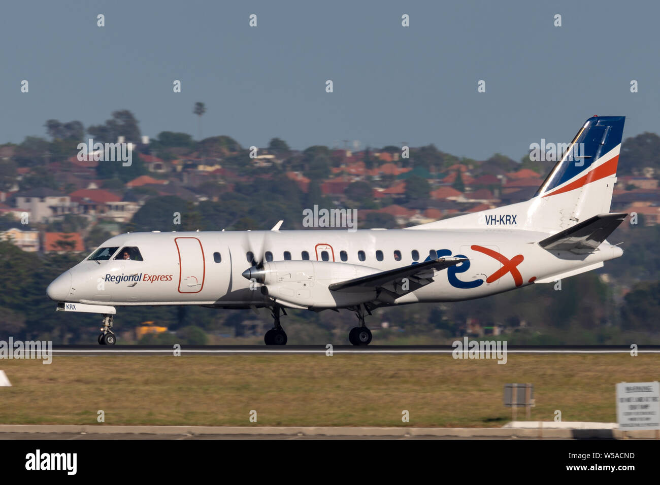 REX (Regional Express Airlines) Saab 340 twin engined regionalen Pendler Flugzeuge, die vom Flughafen Sydney. Stockfoto