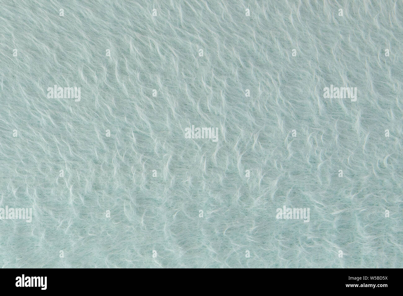 Textur von grauer Wolle zu Garn. Grau-grünen Abstrakt Hintergrund. Grauer wolle zum Filzen. Stockfoto