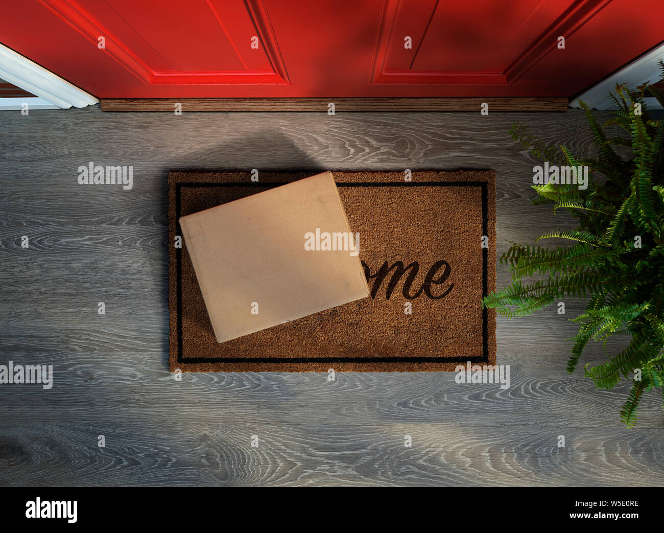 E-commerce Kauf bis vor die Haustür geliefert. Ansicht von oben. Ihr eigenes Label hinzufügen Stockfoto