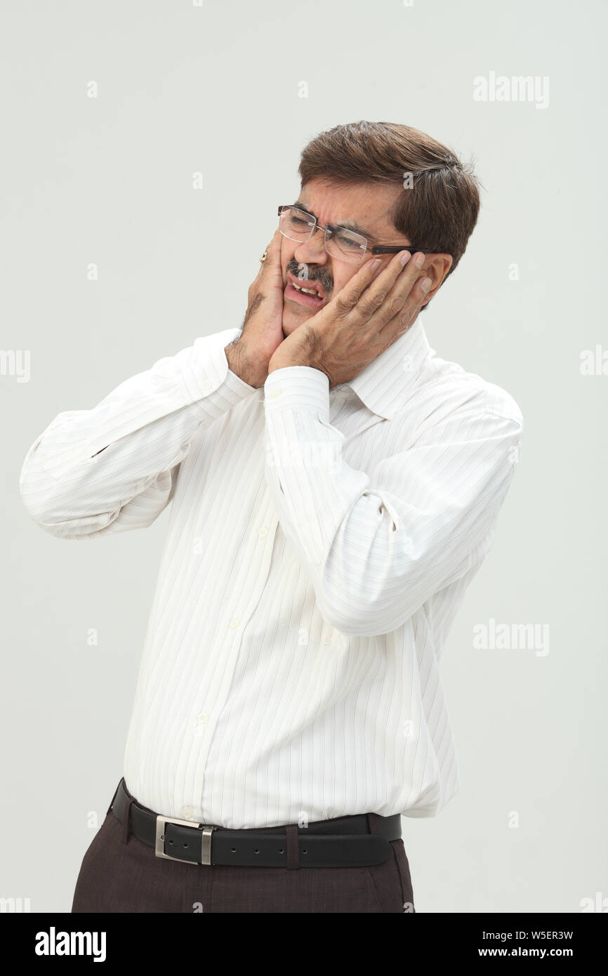 Geschäftsmann Zahnschmerzen leiden Stockfoto