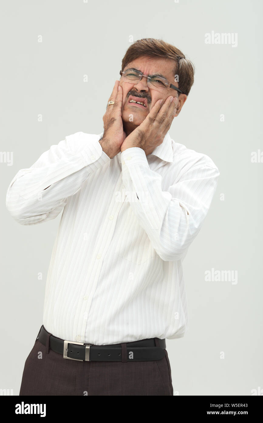 Geschäftsmann Zahnschmerzen leiden Stockfoto