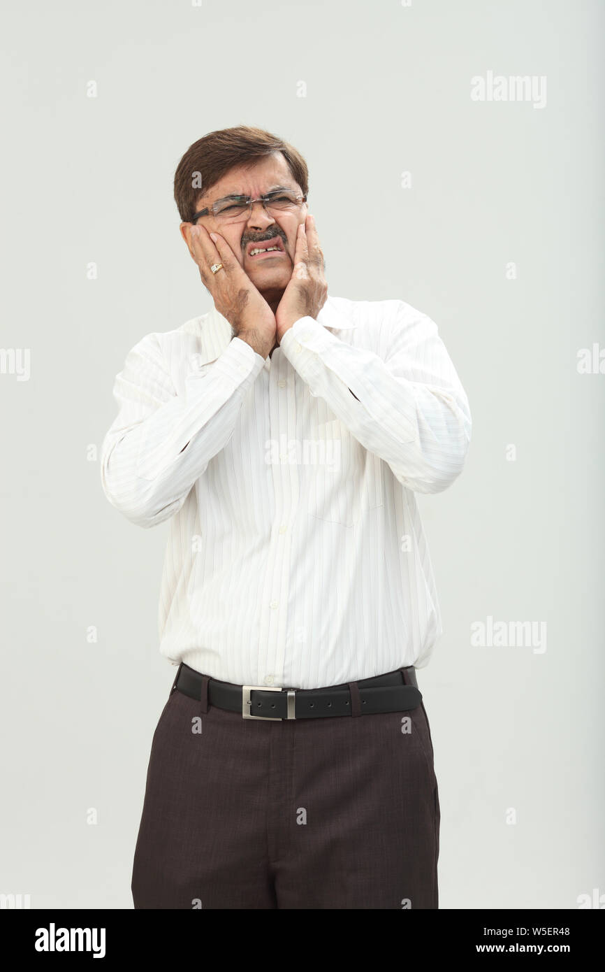 Geschäftsmann Zahnschmerzen leiden Stockfoto