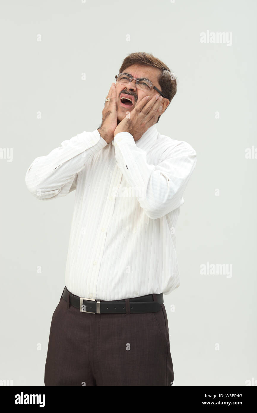 Geschäftsmann Zahnschmerzen leiden Stockfoto