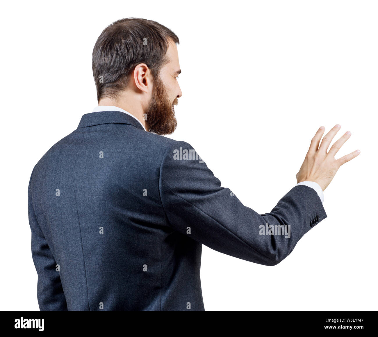 Geschäftsmann in Anzug zeigt ausgestreckte Hand mit gespreizten Fingern. Stockfoto